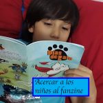 Niño leyendo fanzine Dias de gato